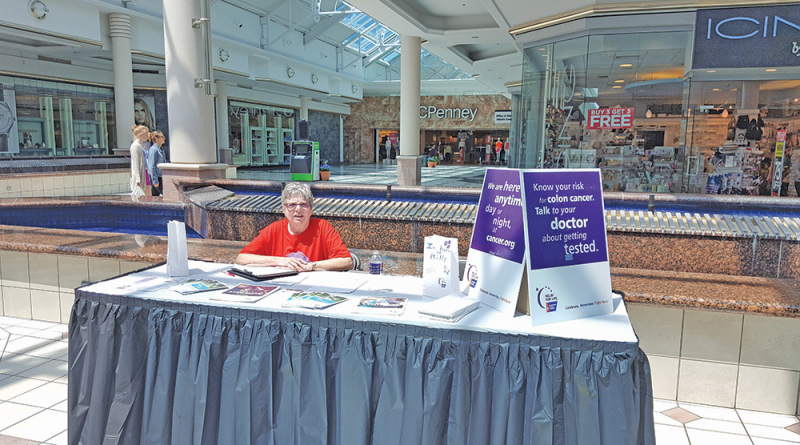Laitenberger helping Relay for Life at Eastview Mall in Victor.