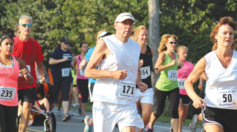 Bruce Rychwalski running in the Crosswinds 5K in Canandaigua last Sept. 5. Since being diagnosed with arrhythmogenic right ventricular cardiomyopathy and having implantable cardioverter defibrillator implantation surgery in 2011, Rychwalski has competed in 190 5K road races: 18 in 2011, 32 in 2012, 51 in 2013, 50 in 2014 and 39 in 2015. And he is still running.
