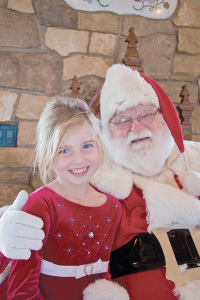 Santa (Walt Krehling) with his granddaughter, Emily (Kyle Meddaugh photo)