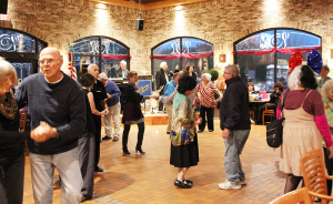 Guests dancing to Johnny Matt Band on a recent Friday night at Market Café at the Eastway Wegman’s in Webster. The band has been a fixture on Friday nights at that location for seven years.