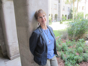 Jeanne Gehret takes a minute to enjoy the garden at the Lightner Museum in St. Augustine, Fla., where she researched 19th century artifacts for her latest book, “The Truth About Daniel.” 