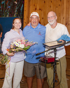 Gary Mervis (center) founder of Camp Good Days and Special Times and Bat McGrath (right) a folk singer from Tennessee and his wife, Tricia Cast during the camp’s Doing A World of Good summer program, a program for children from around the world who have cancer. McGrath composed a song for Camp Good Days in 2015. 