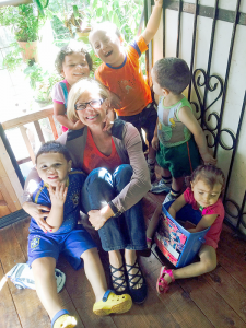 Dee Dee Williams takes a moment with some of the children at a government-sponsored daycare in Costa Rica, where she volunteered for five weeks in 2014. Photo provided