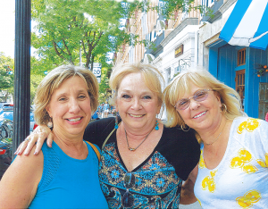 Solo Travelers Club members (from left): Deb Rouviere of Syracuse, Karen Sheldon and Sherry Gillis, both from Rochester, posed for this photo after enjoying a winery tour and lunch in Skaneateles.