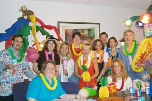 Dixon Schwabl employees dress up for Hawaiian Day at the office.