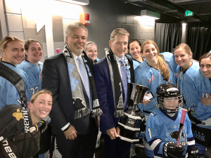Ric Seiling with assistant coach, Craig Muni and the Buffalo Beauts.