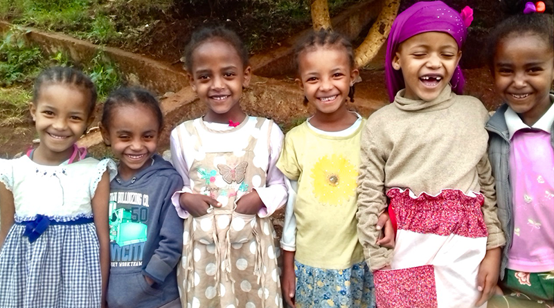 A group of girls from Mali sporting new dresses made by Savvy Sew-ers in Rochester