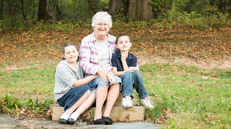 Dee Kuhn became Mema to her grandchildren. One of her granddaughters, now 23, couldn’t say Grandma, so it came out Mema. Kuhn is flanked by grandkids Megan Adams (left) and Josiah Adams. Photo submitted.