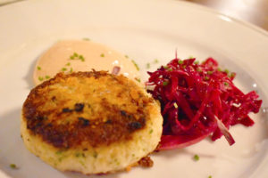 The hockey puck-sized crab cake was delightful with a lightly crisp outside and soft meaty inside.