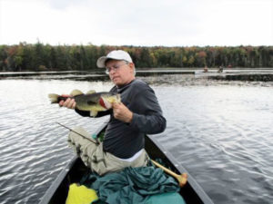 Rochester-based writer Todd Etshman fishing with friends in the Adirondacks this fall. “The value of enjoying something like an Adirondack Mountain fishing trip with several 55-plus friends in the fall is indeed, priceless.”