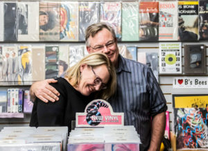 Tom Kohn, owner of Bop Shop Records in Rochester, has been in the record business close to 50 years. He says he never gave up on the popularity of records rebounding. “I knew they’d be around for a while.” Next to him is his wife Jann.