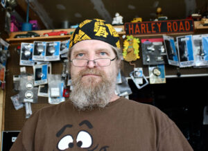 Ray J. Delue, 54, owner of Ray J’s, a corner shop selling parts and accessories for American motorcycles in Newark. 