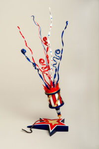 “American Spirit Rising” depicts a patriotic popper created for a juried exhibit. Made of maple, compressed polystyrene, brass, molding paste, paint. Photo provided.