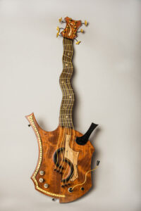 “Badda Bubinga” is a decorative guitar inspired by the styles of Pablo Picasso and Jimi Hendrix. Made of ebony, holly, spalted maple and bubinga woods, brass, gold leaf. Photo provided.