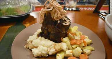 Think Local. Eat Local. Be Native. Native Eatery’s porter-braised pork shank ($24): The hunky pork sat in the middle of the plate, surrounded by veggies and whipped potatoes. Frizzle-fried onions decorated the pork like medals on a military hero.