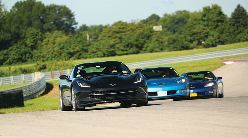 Members of the Rochester Corvette Club practice cleaning out their fuel injectors on the track in Bowling Green, K.Y. in August of 2019 at the end of a caravan from Rochester to the 25th Anniversary of the Corvette Museum.