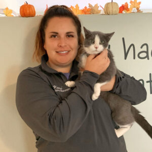 Shelter operations manager of Pet Pride of New York Inc. in Victor, poses with a cat from their shelter.