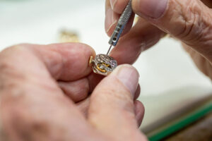 Precision and a steady hand are required for watch repair.